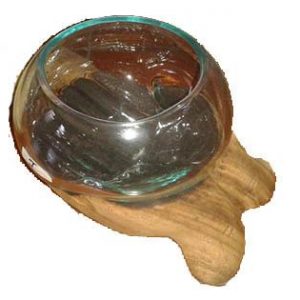 Glass vase on wooden handGlass vase on wooden hand